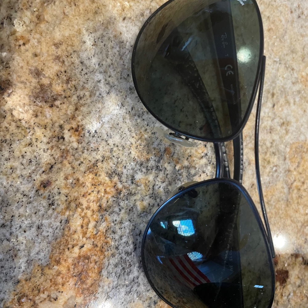 black tinted aviator sunglasses by raybans